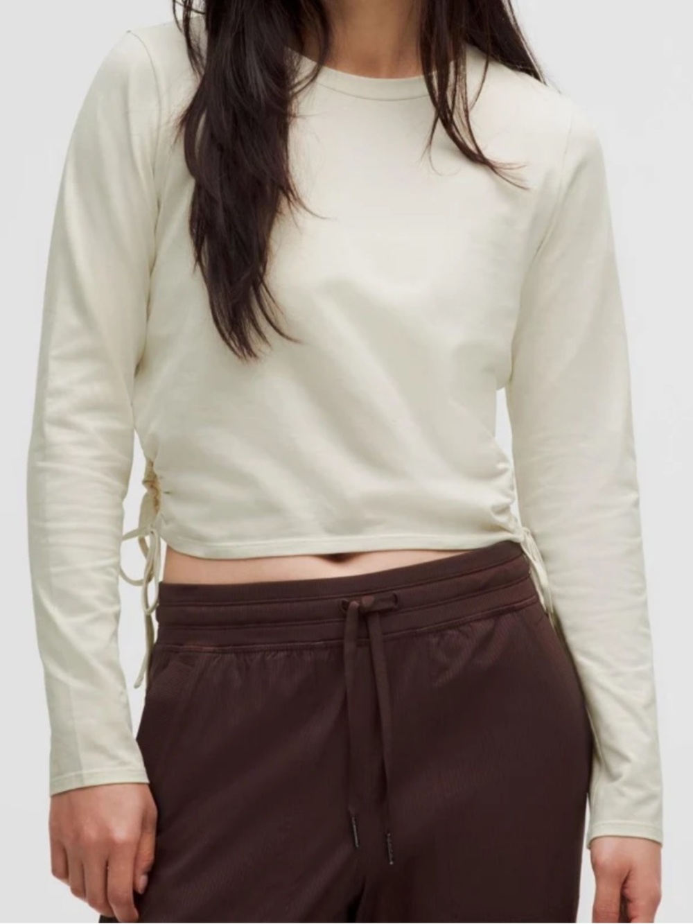 Lululemon women’s Cinched Cut-Outs Cotton Long-Sleeve Shirt in the color bone